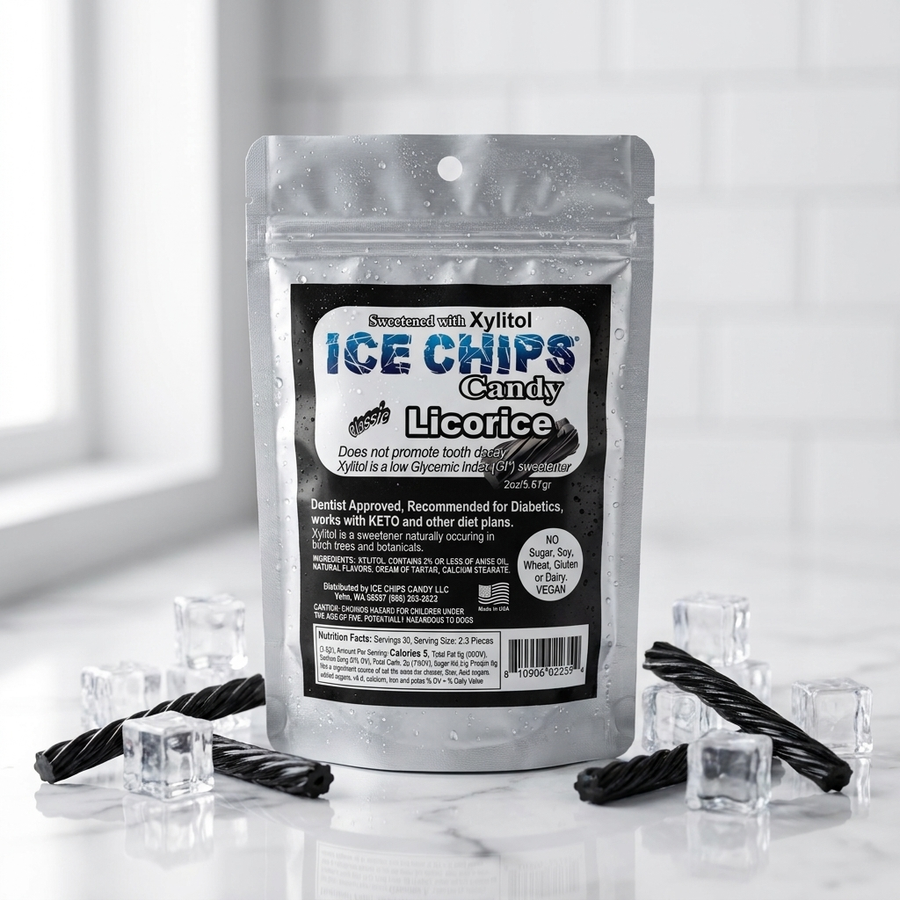 A silver resealable pouch of licorice ice chips candy stands on a glossy white surface with clear ice cubes and twisted black licorice around it. The front label reads 'ICE CHIPS Candy Licorice' and shows the brand as Sweet Tarts Approved.