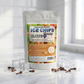 A stand-up pouch of Ice Chips Candy Clove flavor, surrounded by clear ice cubes and cloves on a bright white countertop.
